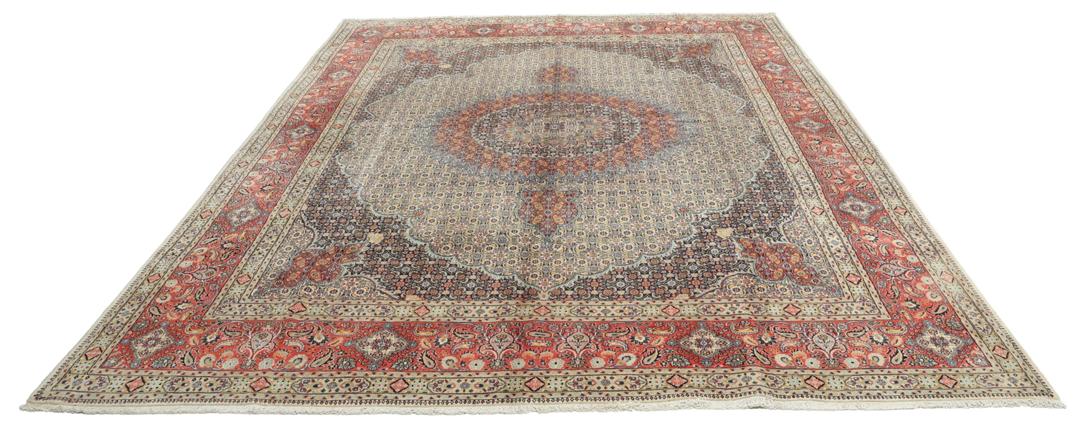Hand-knotted Moud rug from the Middle East featuring a multicolor floral medallion design.