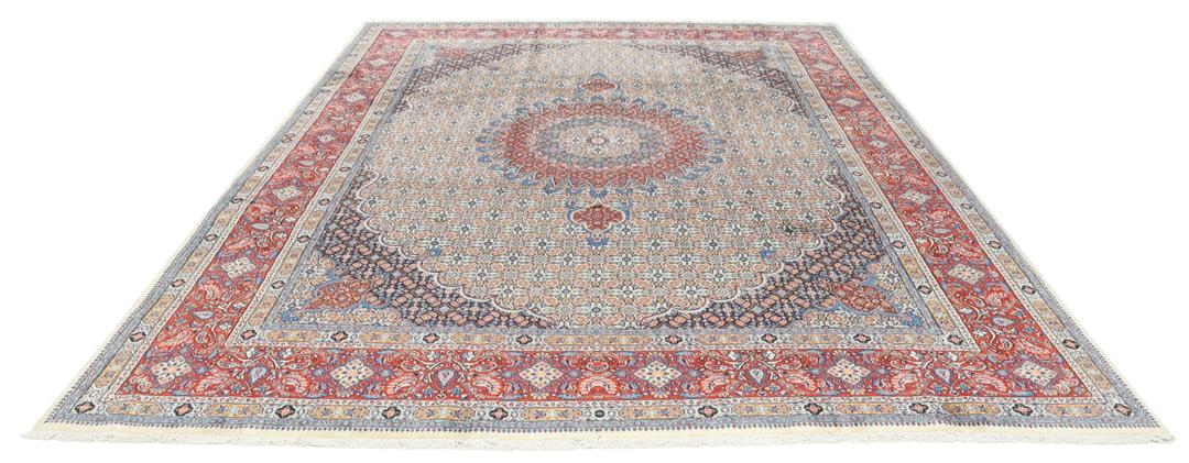 A hand-knotted Moud rug from the Middle East with a detailed medallion in multicolor.