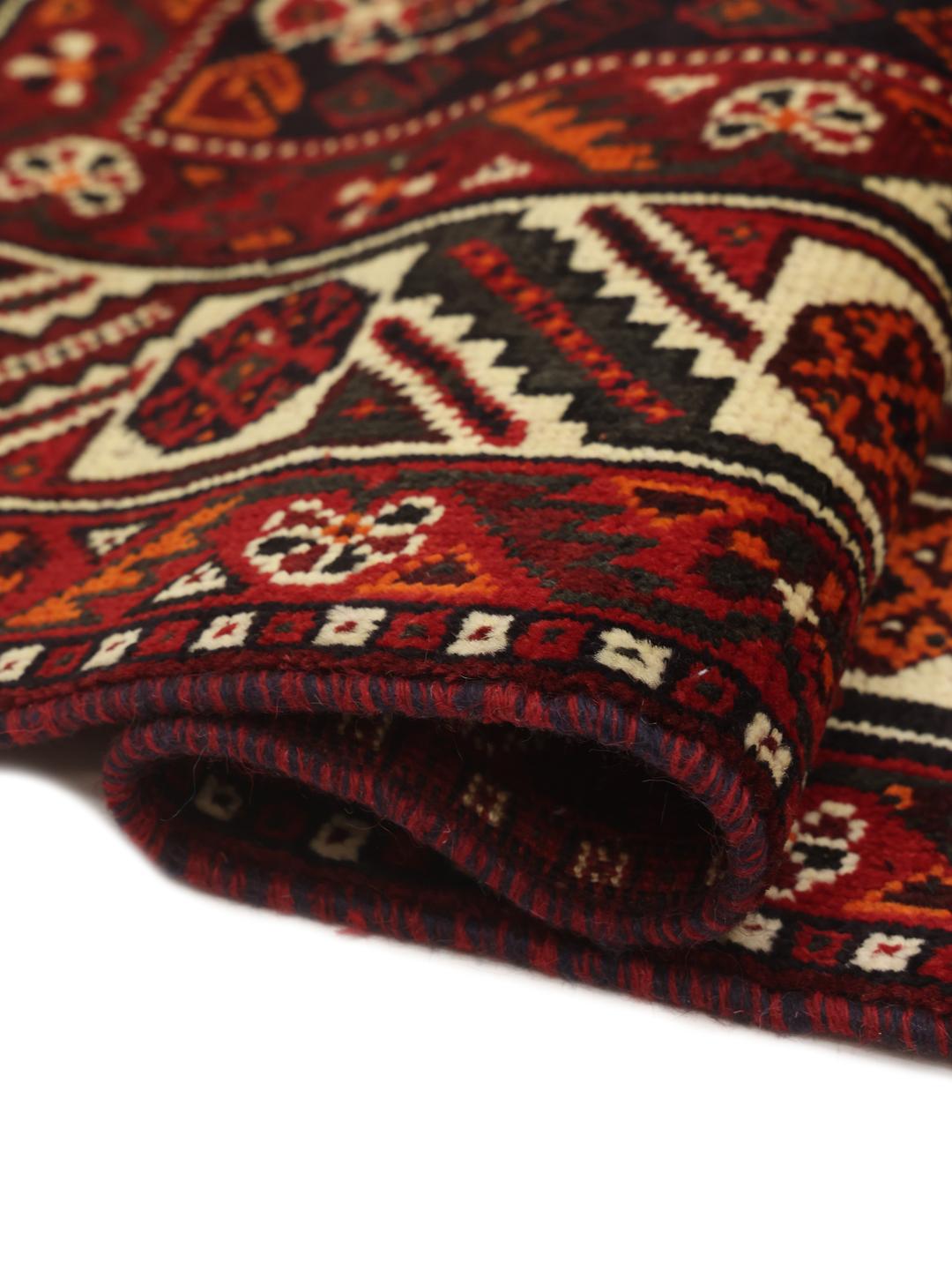 Hand-knotted Shiraz rug from the Middle East in deep red tones