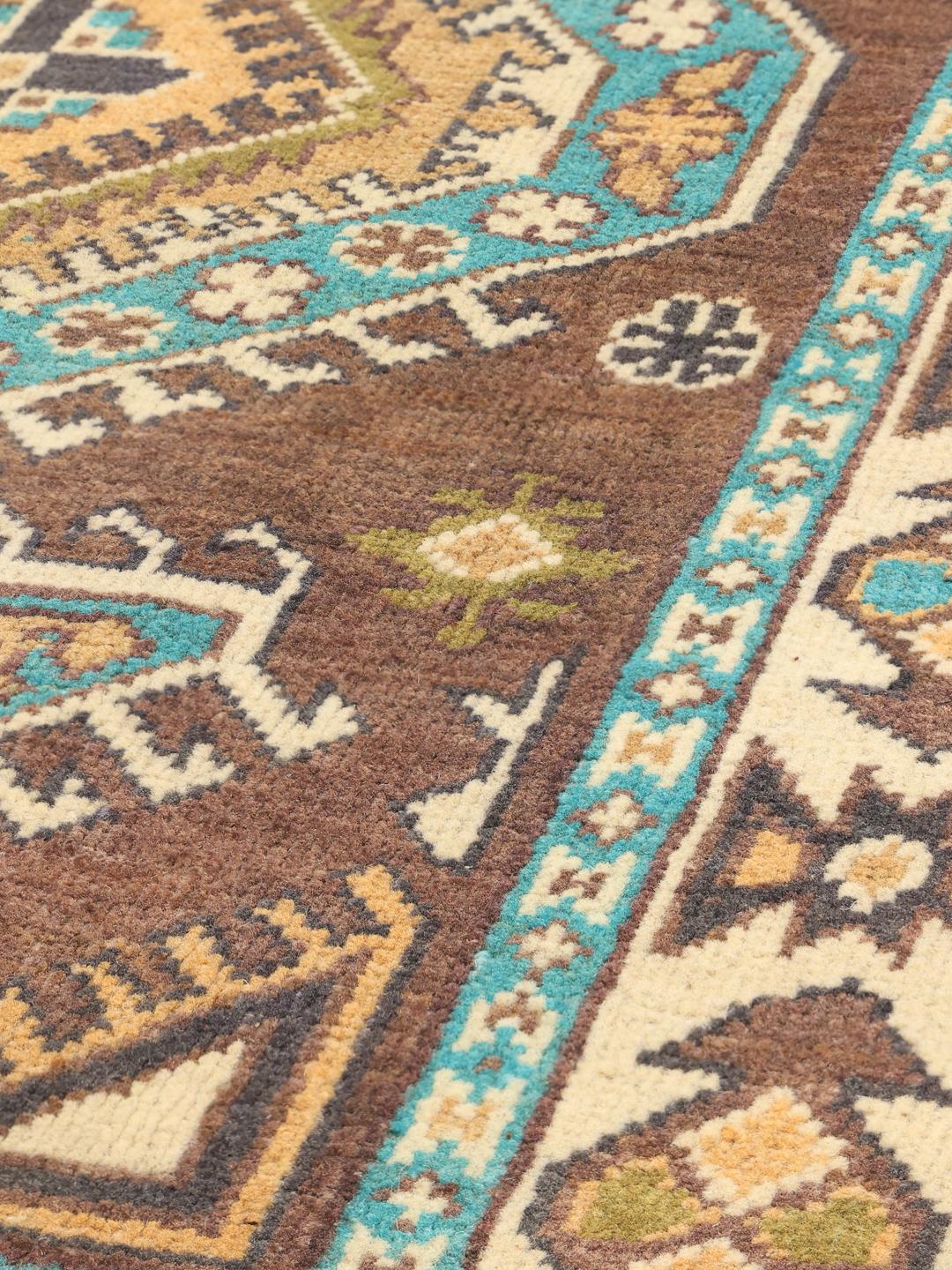 Alfombra Kazak anudada a mano de Afganistán en tonos marrón y azul
