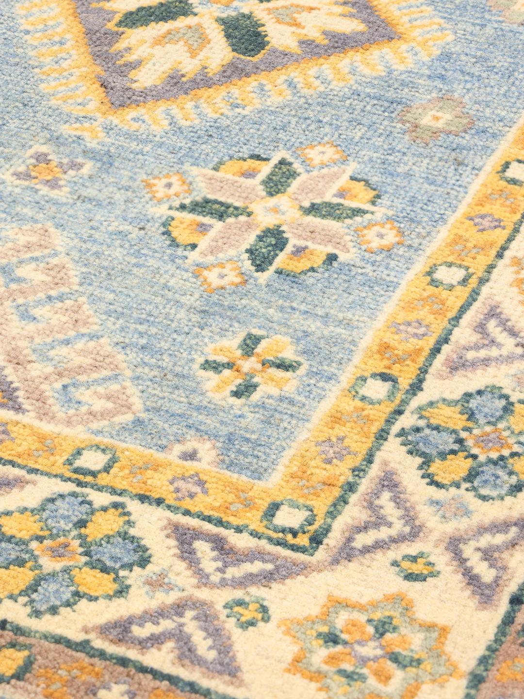 Handgeknoopt Afghaans Kazak-tapijt met een blauw veld en geometrische motieven