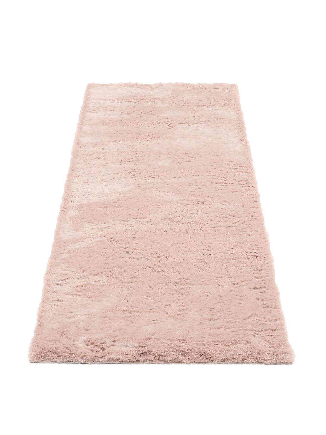 En blød pink løber med en fyldig tekstur.