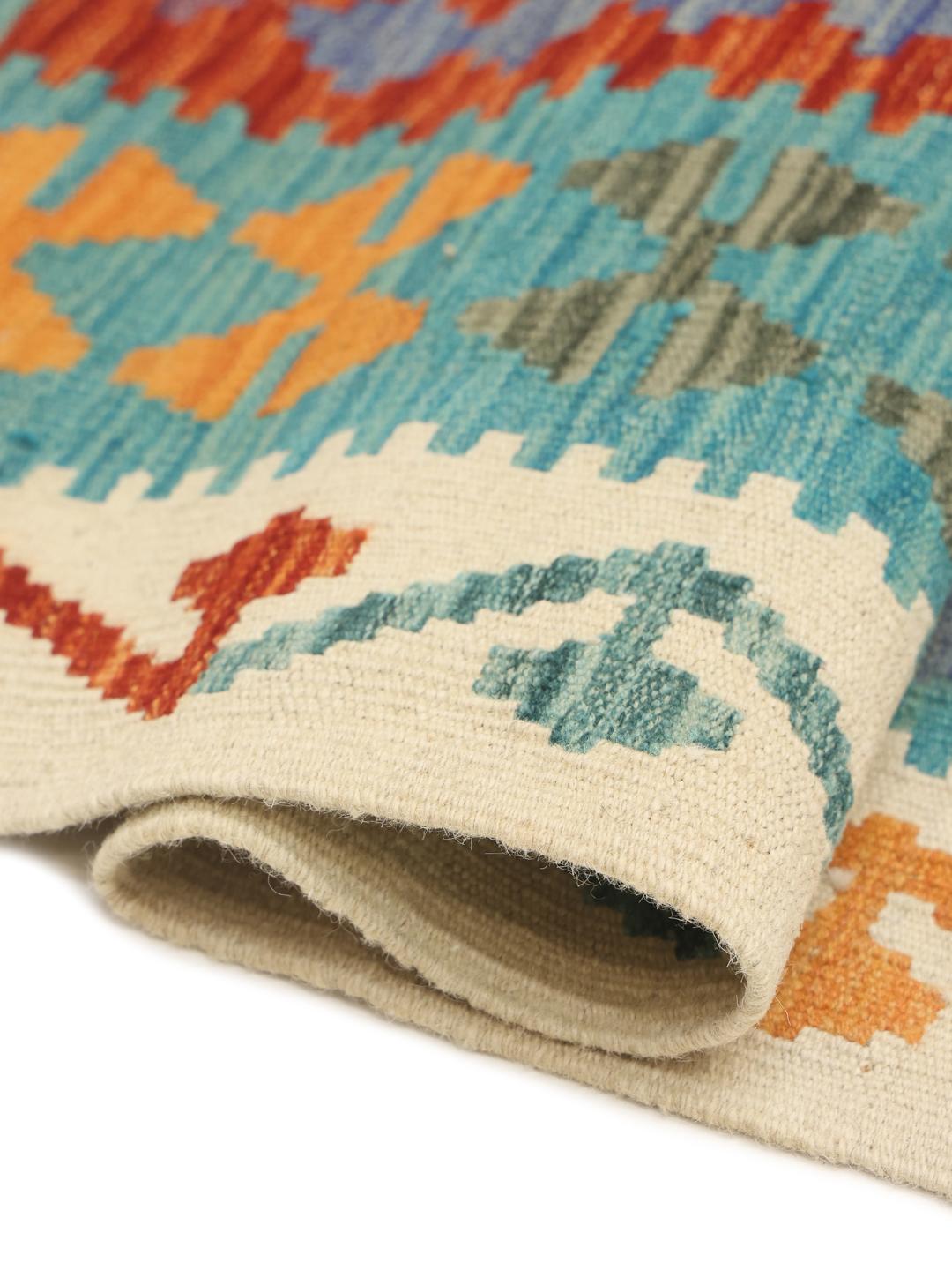 Hand-woven Afghan Kelim rug with a vibrant multicolor diamond pattern