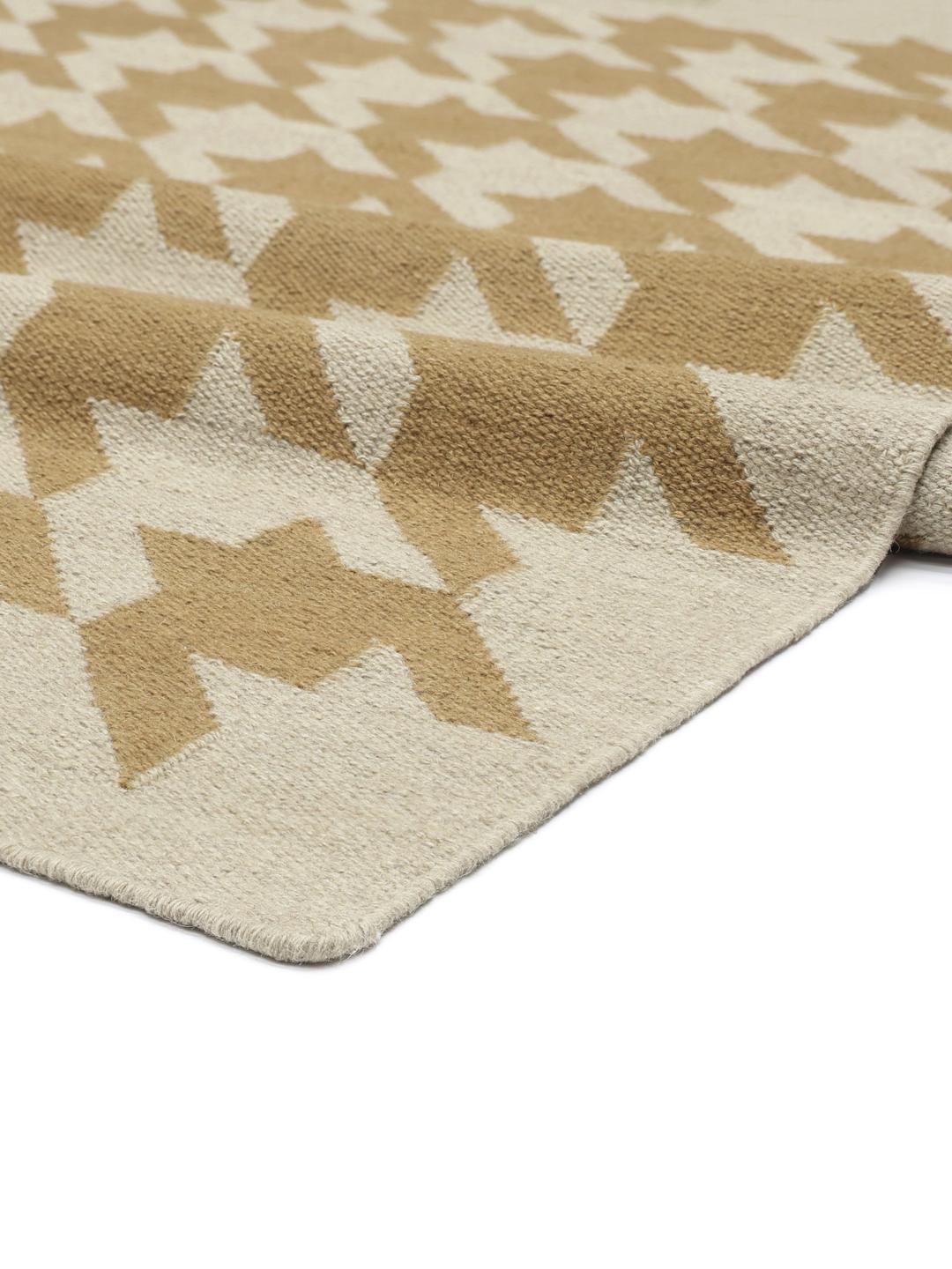Beige en bruin tapijt met houndstooth-patroon