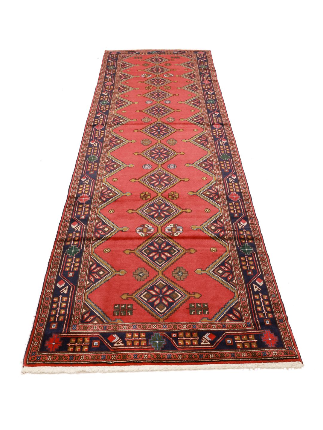 Hand-knotted Middle Eastern runner in red with geometric motifs