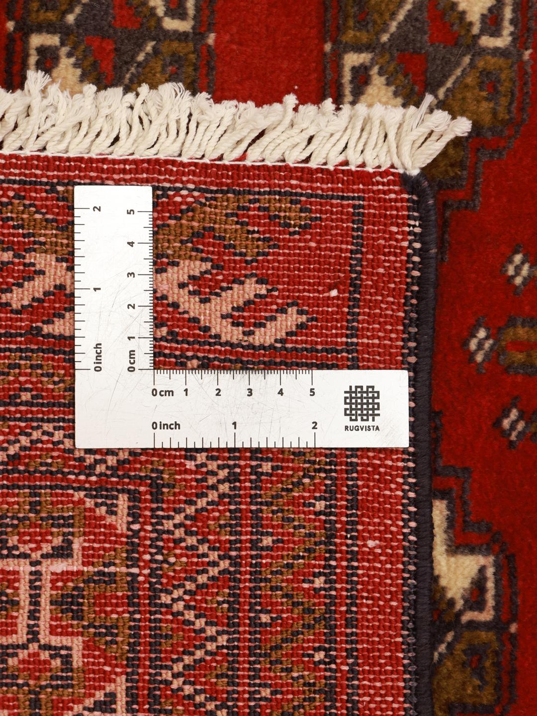 Hand-knotted Turkaman runner from the Middle East in deep red