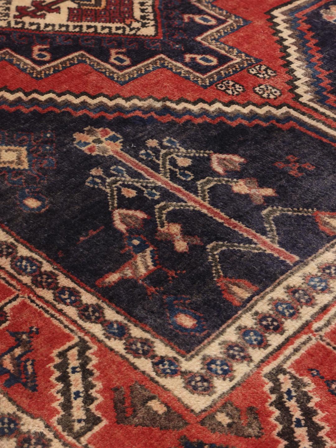 Handgeknoopt Afshar-tapijt uit het Midden-Oosten in rood en blauw