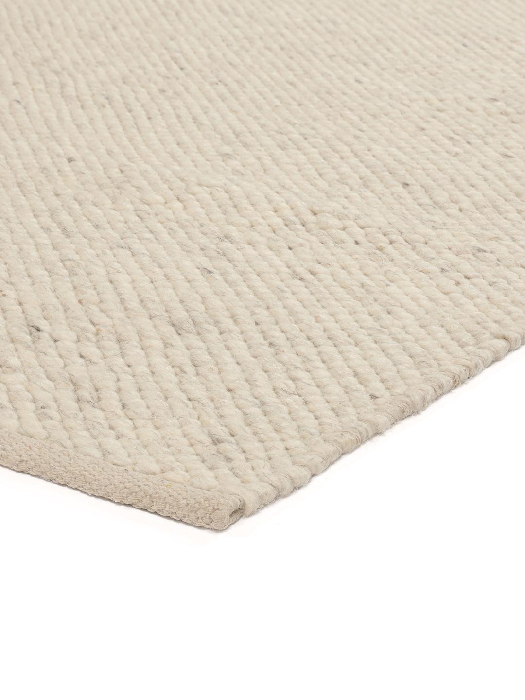 Håndvævet beige uldtæppe