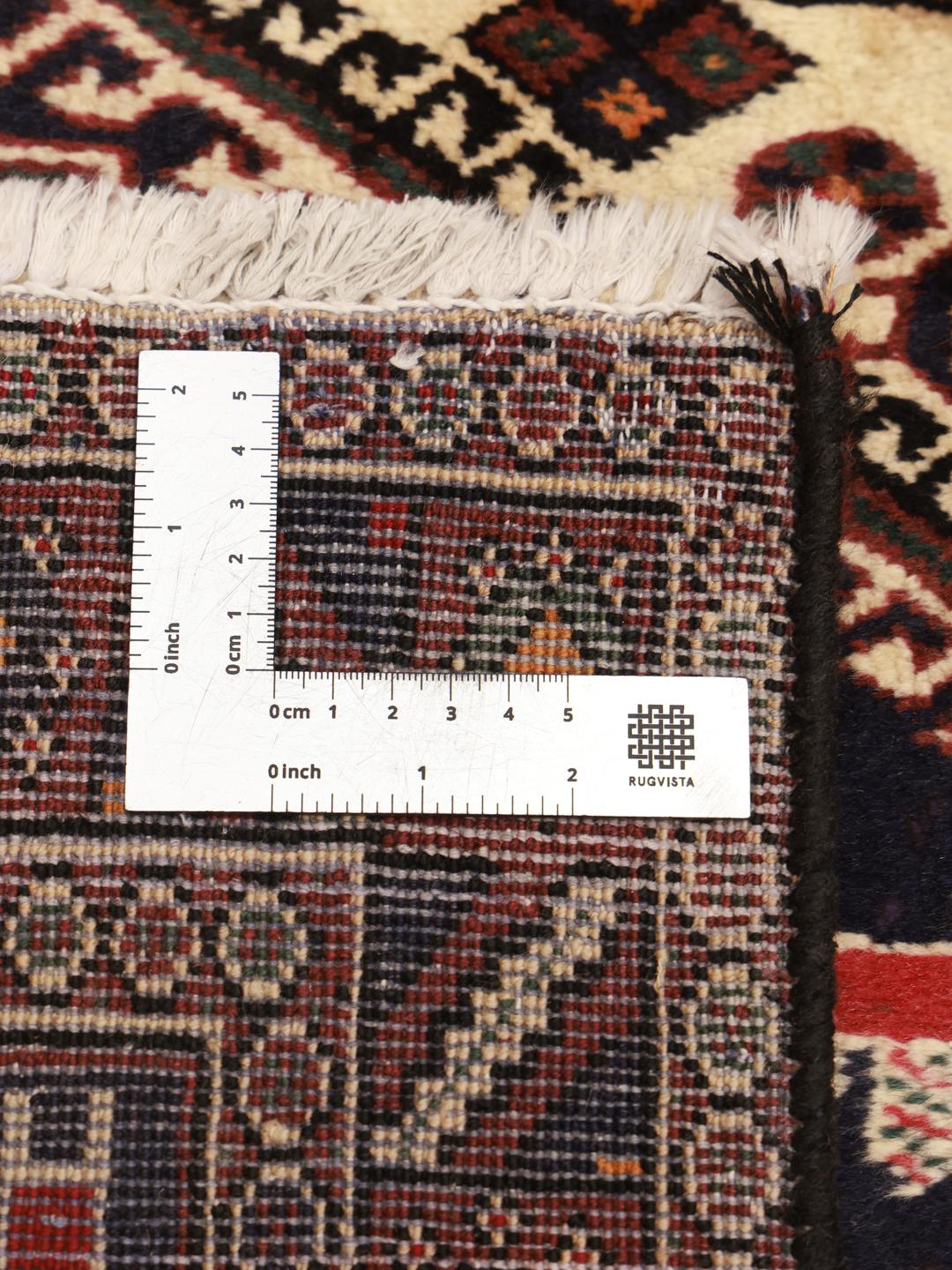 Hand-knotted Afshar Shahre Babak rug from the Middle East in dark-red and beige