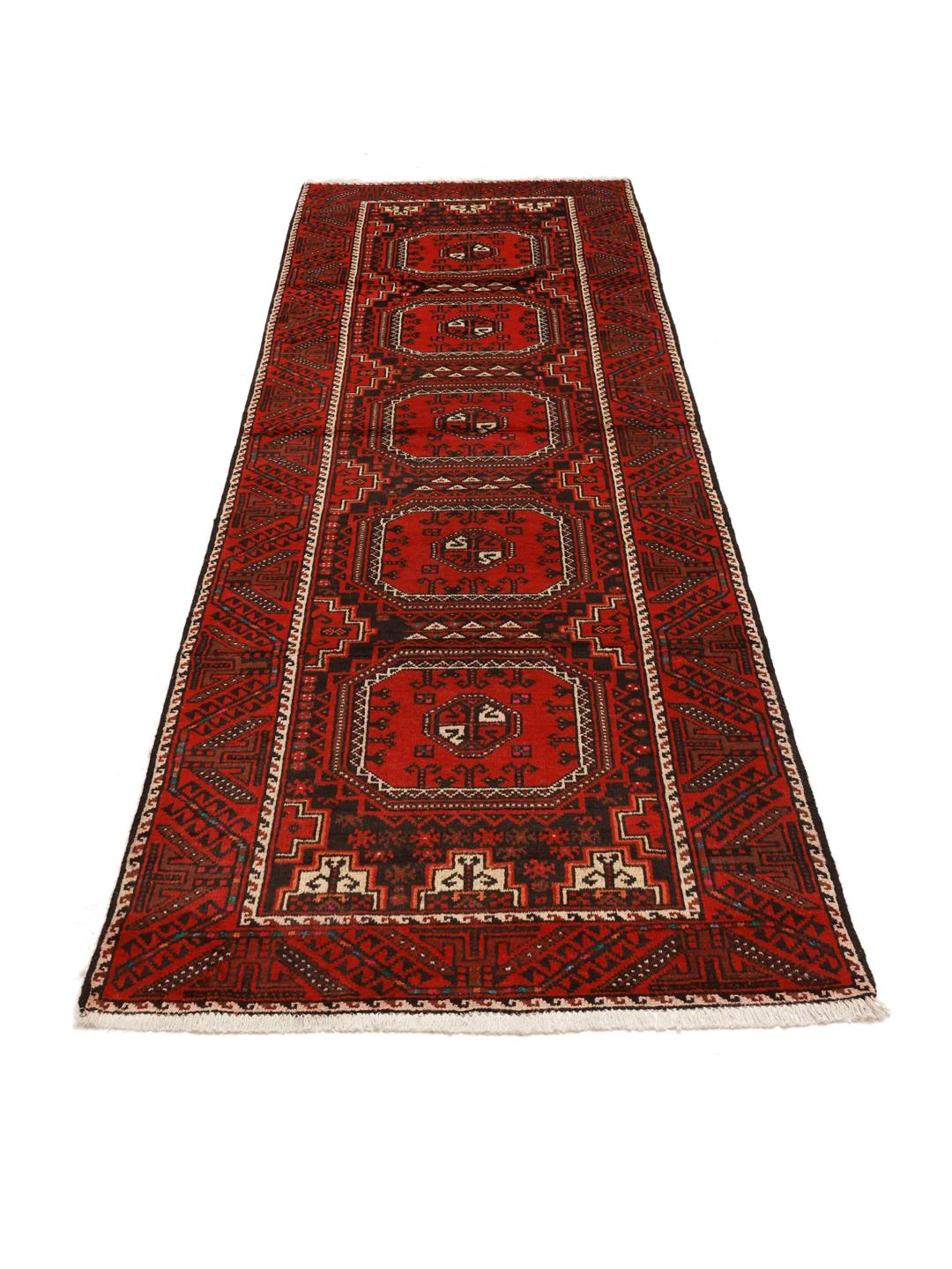 A hand-knotted Hamadan runner from the Middle East featuring a red field and traditional geometric motifs.