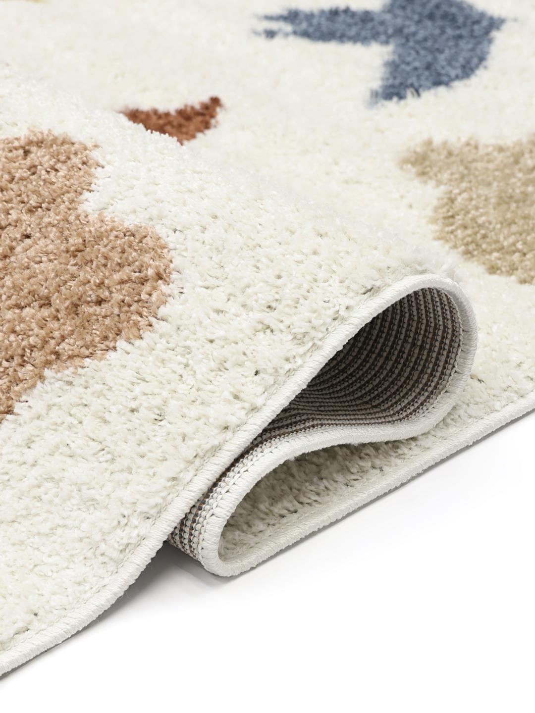 Kinderkleed in off white met veelkleurige vogel- en sterrenmotieven