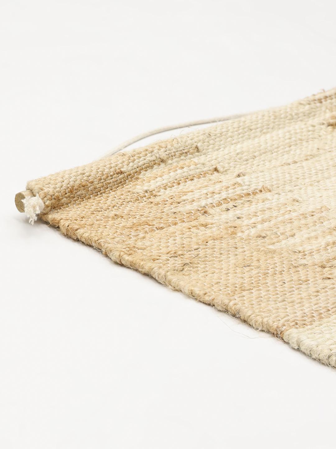 Beige wanddecoratie met een geweven textuur