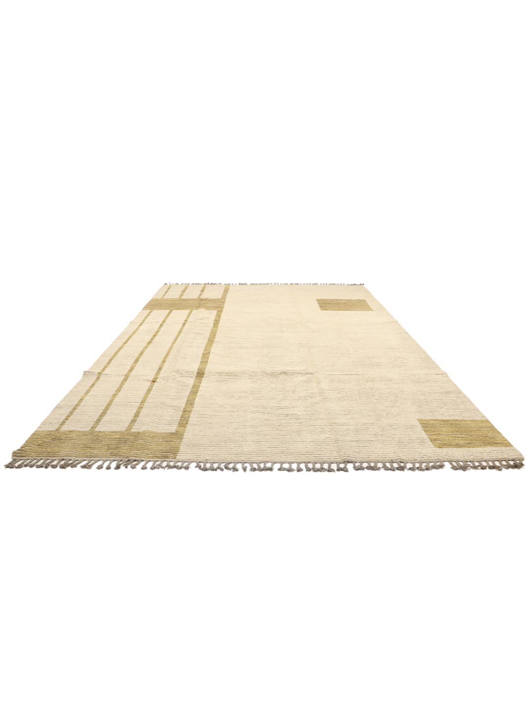 A large rectangular hand-knotted rug from Afghanistan in beige and gold with geometric lines and block motifs.