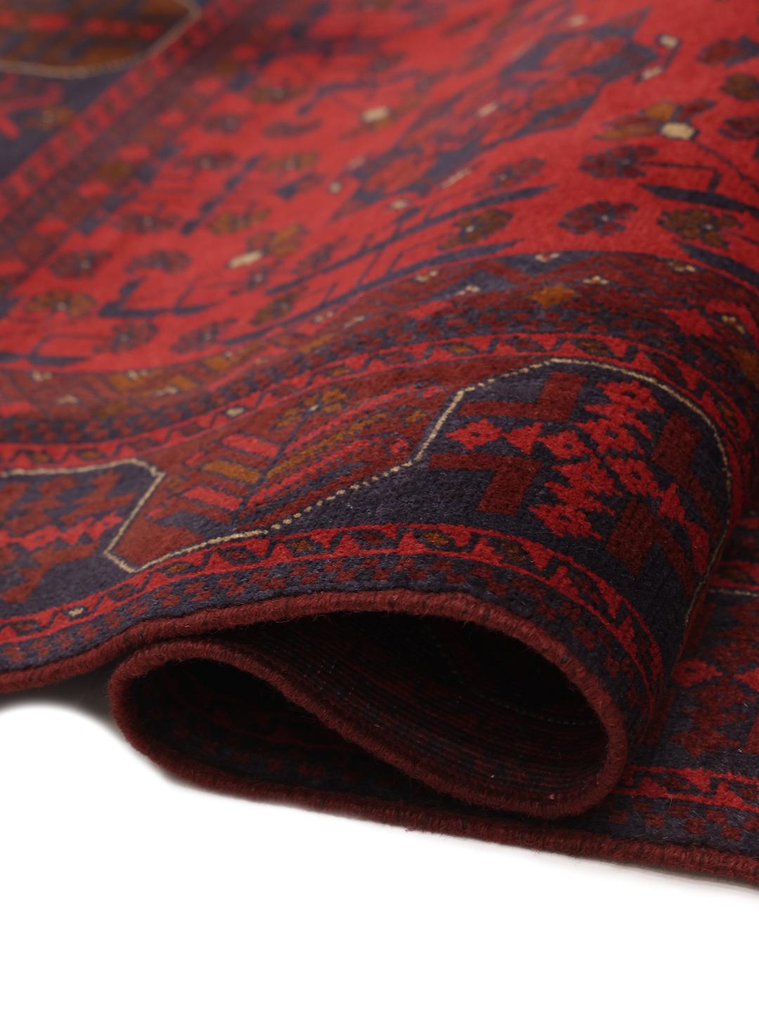 Hand-knotted Afghan Khal Mohammadi rug in rich red tones featuring traditional geometric motifs.