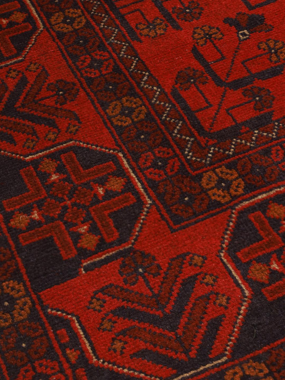 Hand-knotted Afghan Khal Mohammadi rug in deep red