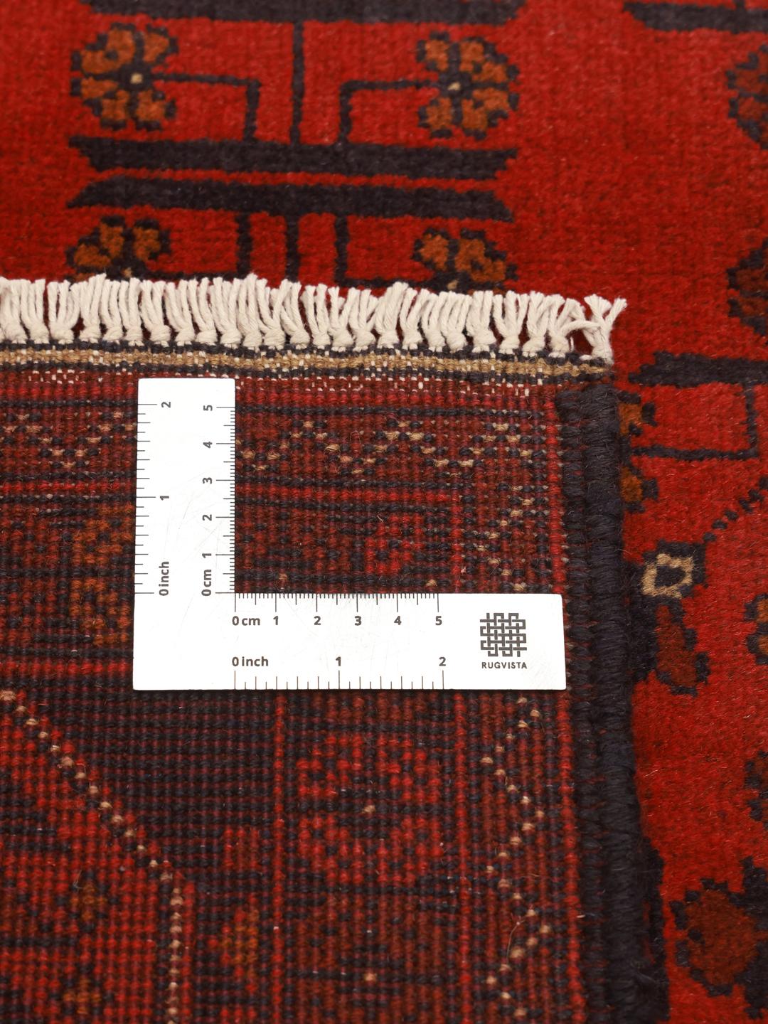 Hand-knotted Afghan Khal Mohammadi rug in deep red