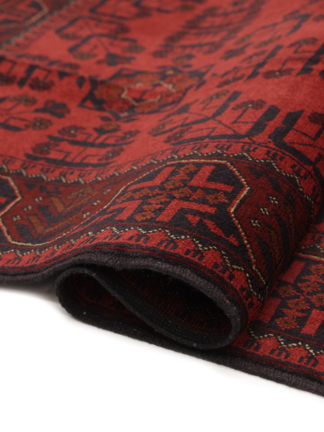 Hand-knotted Afghan Khal Mohammadi rug in deep dark-red with geometric patterns