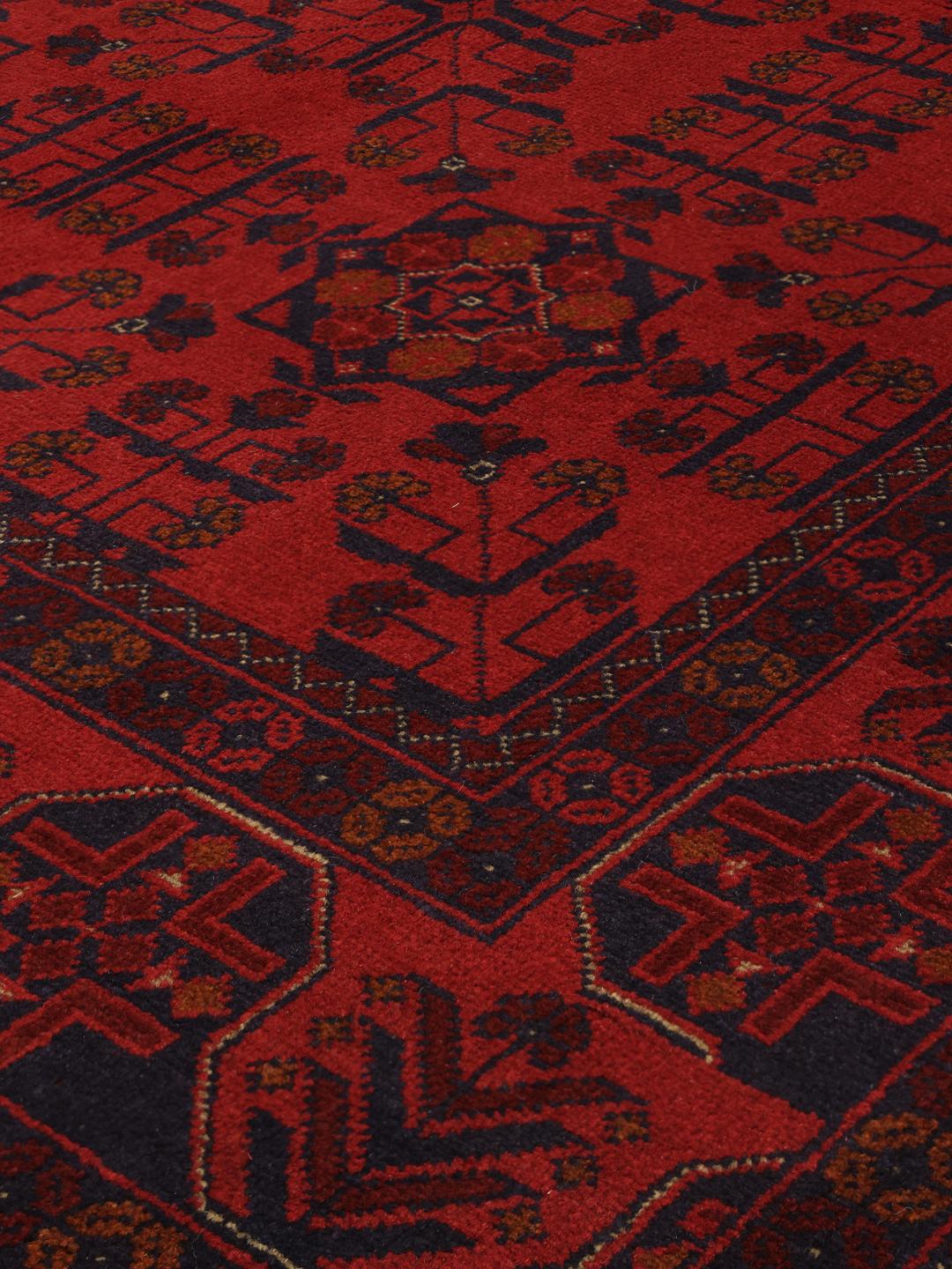 Hand-knotted Afghan Khal Mohammadi rug in rich red and deep blue tones