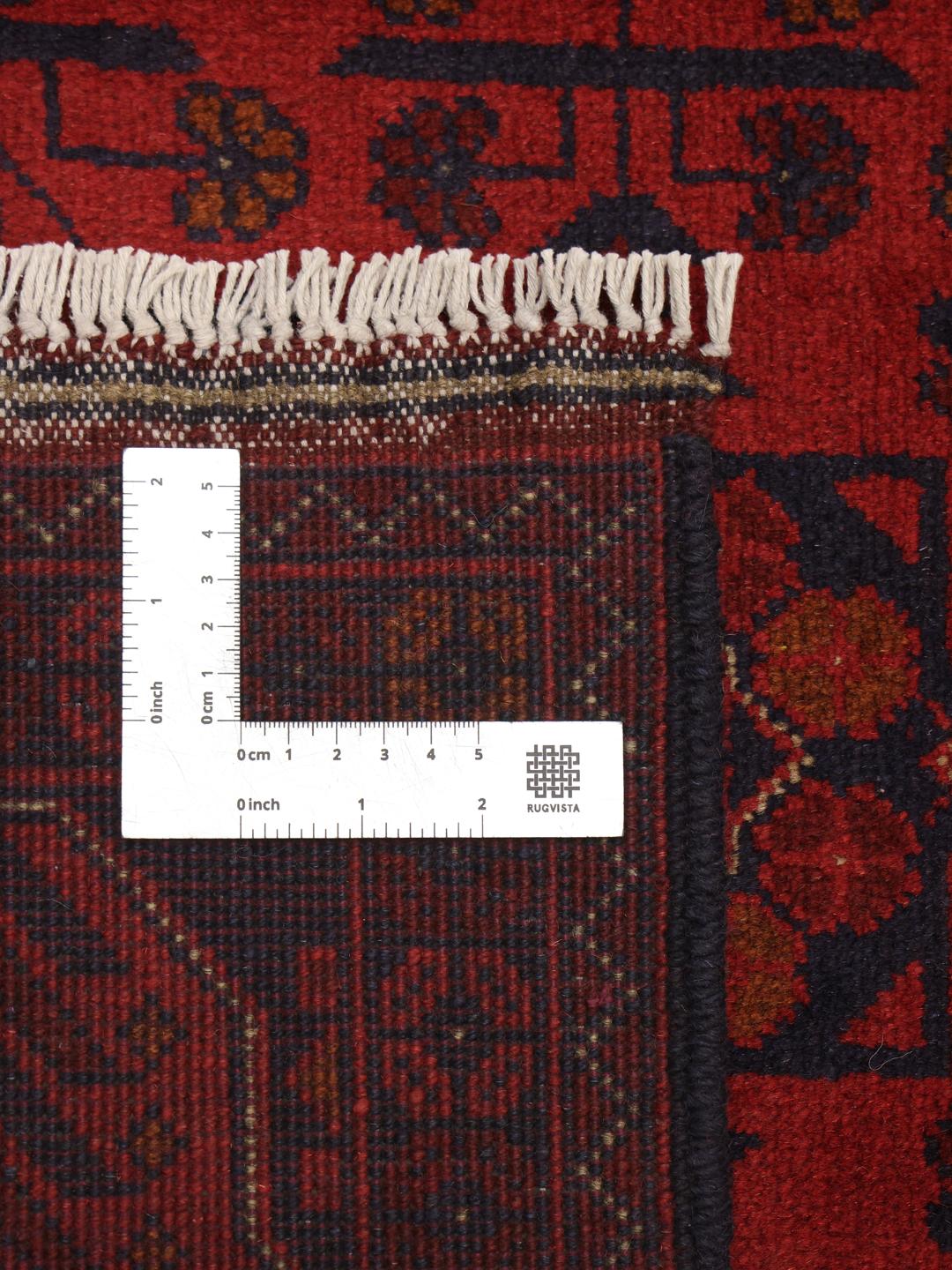 Hand-knotted Afghan Khal Mohammadi rug in rich red and deep blue tones