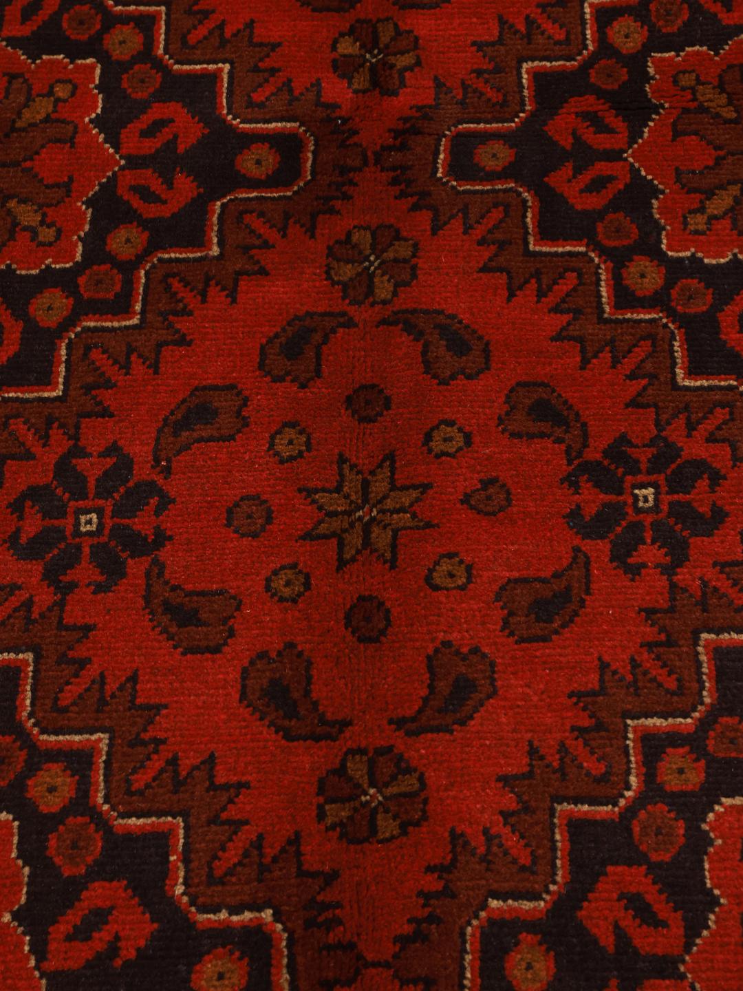 Hand-knotted Afghan Khal Mohammadi rug in deep red tones