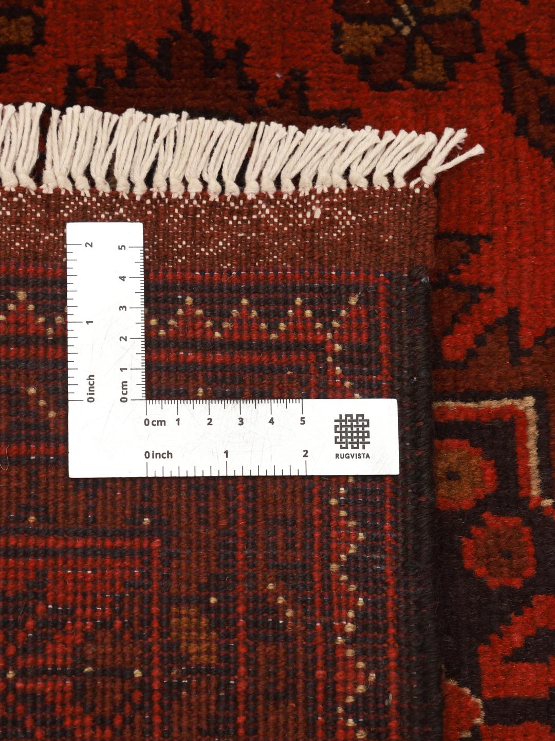 Hand-knotted Afghan Khal Mohammadi rug in deep red tones