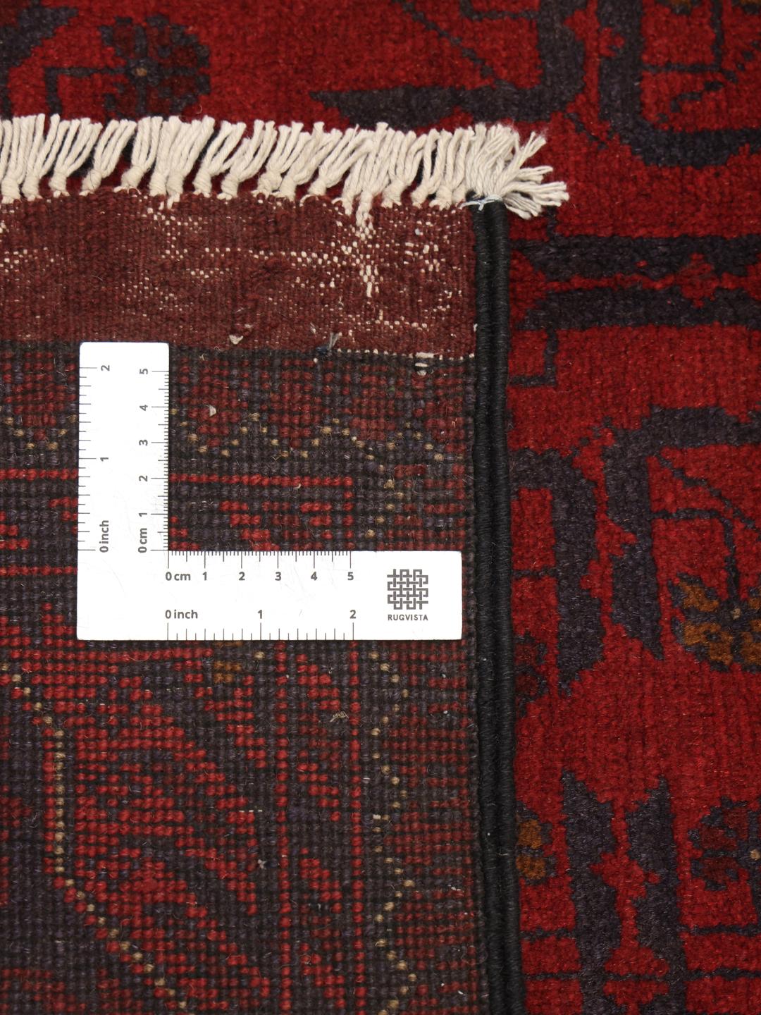 Hand-knotted Afghan Khal Mohammadi rug in rich red tones