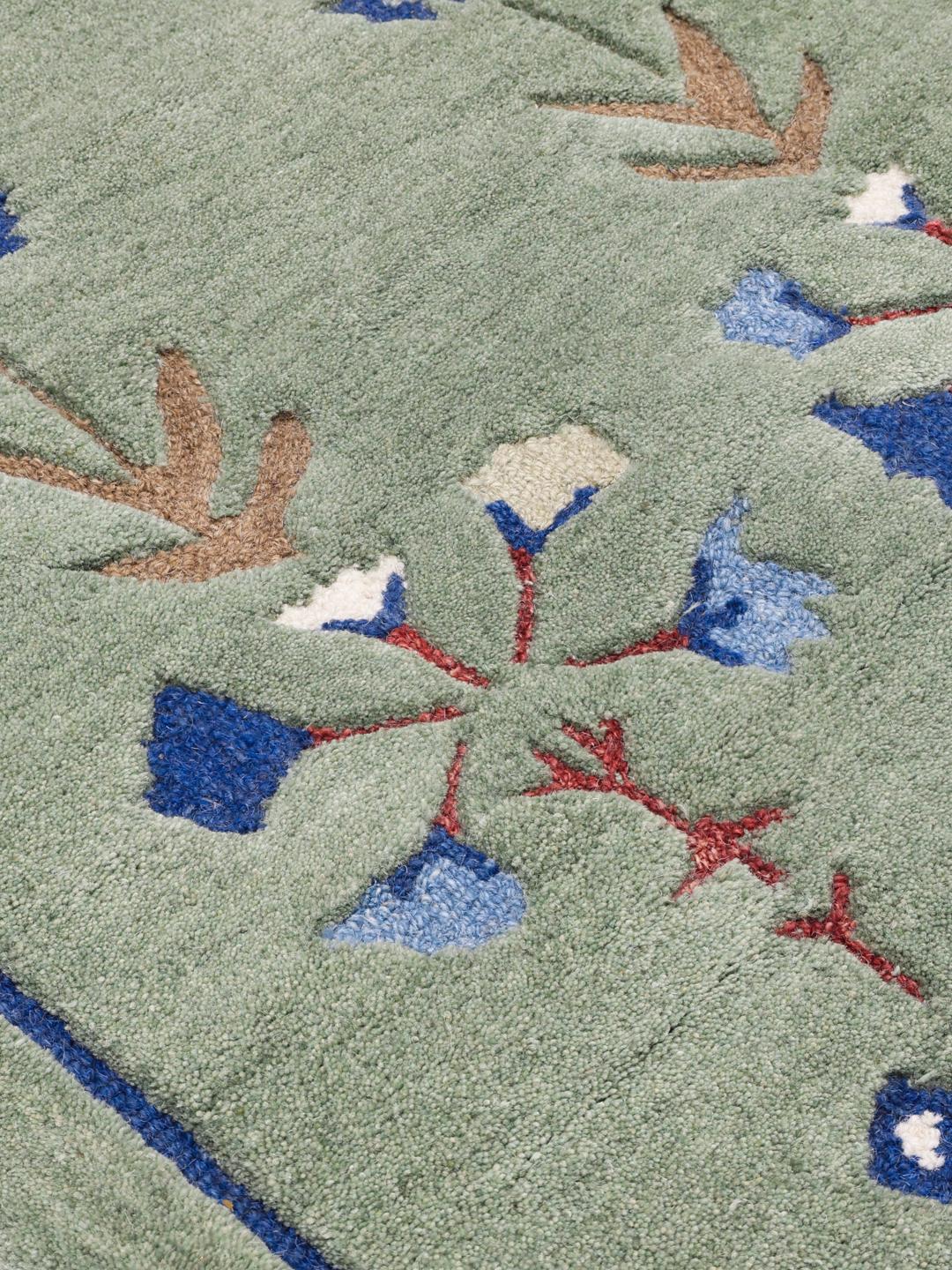 Rosalina tapijt in mintgroen en blauw met een bloemenpatroon