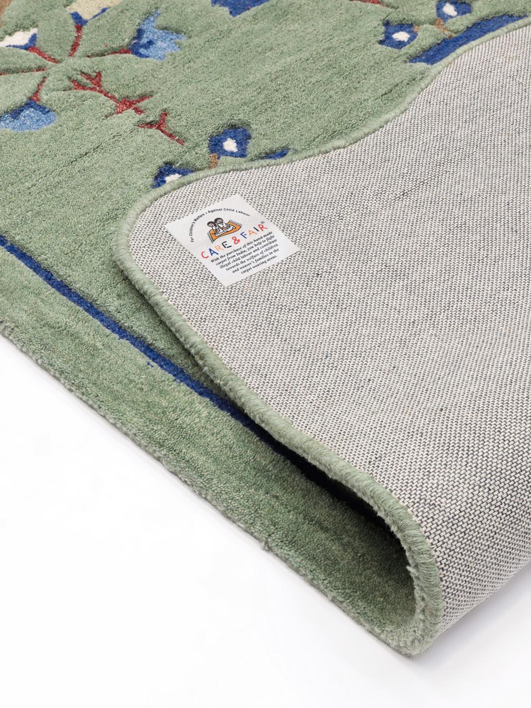 Rosalina tapijt in mintgroen en blauw met een bloemenpatroon