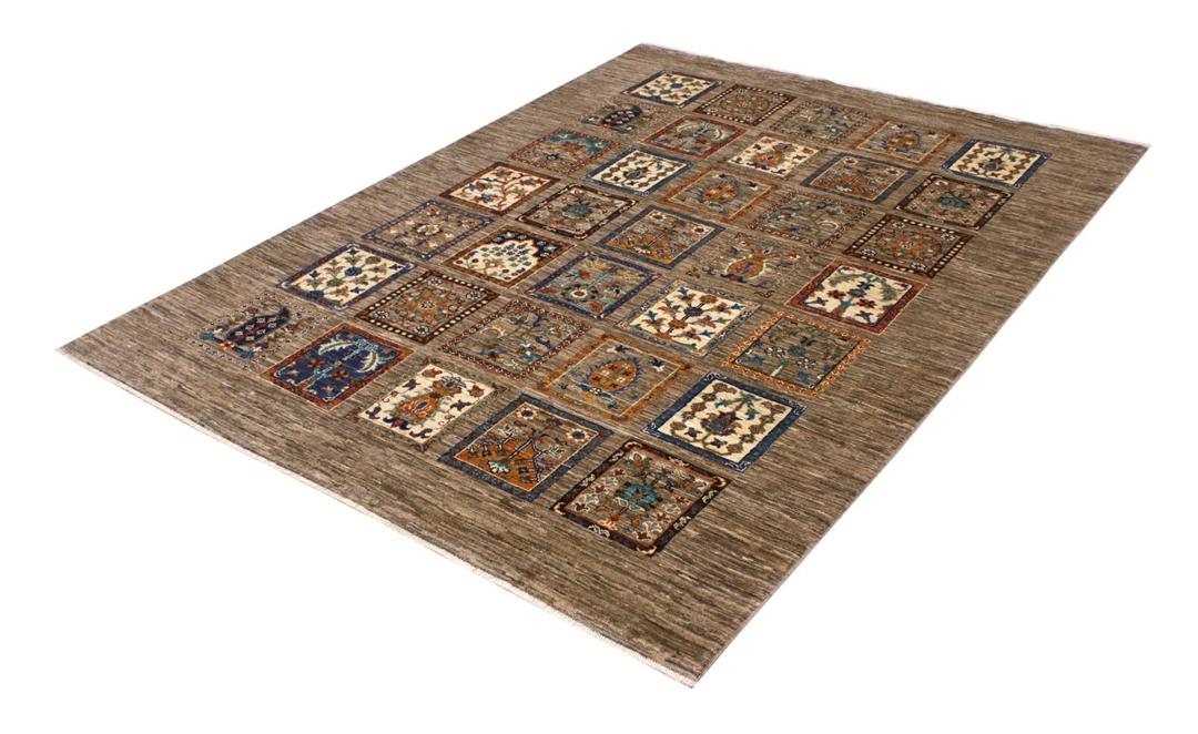 Hand knotted Wool rug from Afghanistan in brown with a panelled pattern