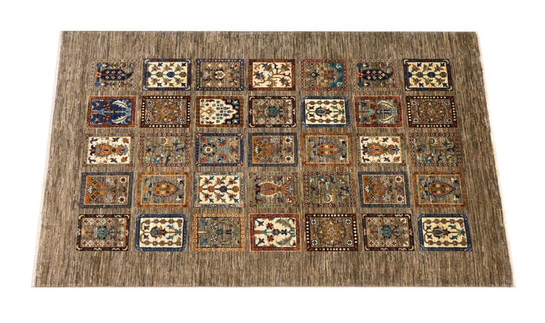 Hand knotted Wool rug from Afghanistan in brown with a panelled pattern