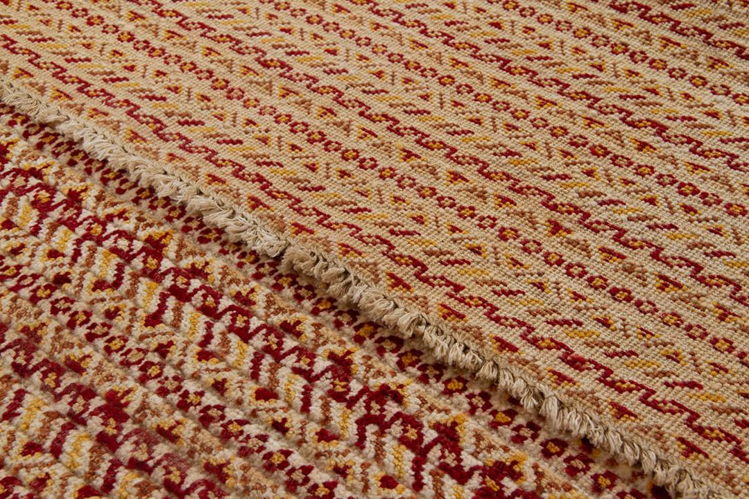 Handgeknoopt Gabbeh-tapijt uit Afghanistan in rode en beige tinten