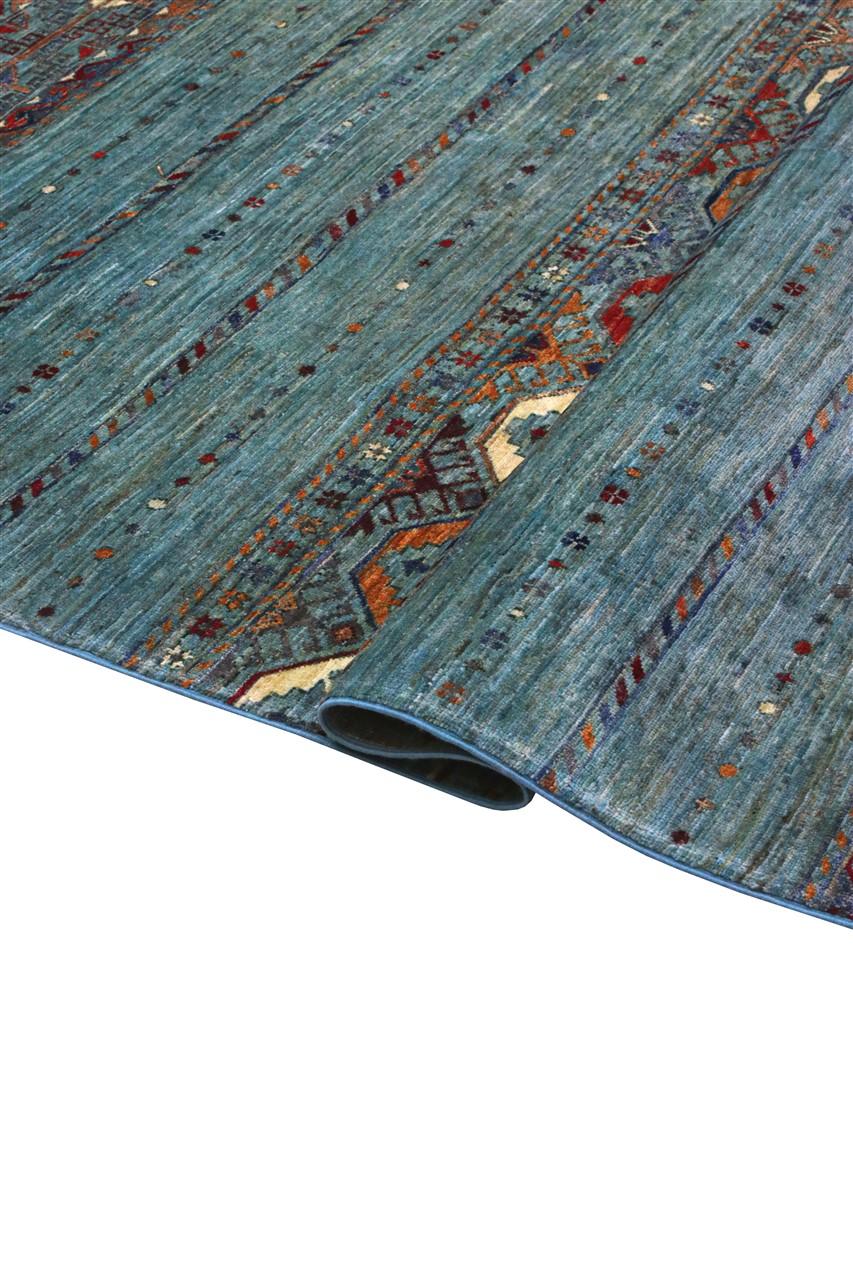 Handgeknoopt Afghaans tapijt in blauw met tribale patronen