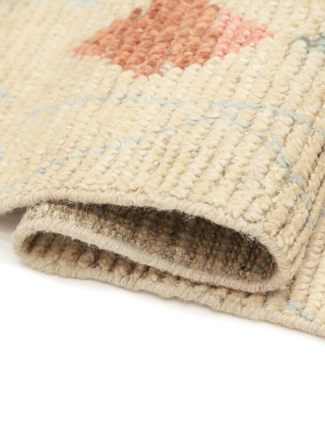Hand-knotted Afghan rug with a beige base and colourful geometric patterns