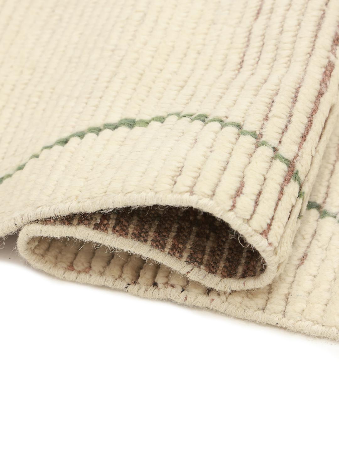 Hand-knotted Berber style rug from Afghanistan with colourful diamond patterns on a beige background
