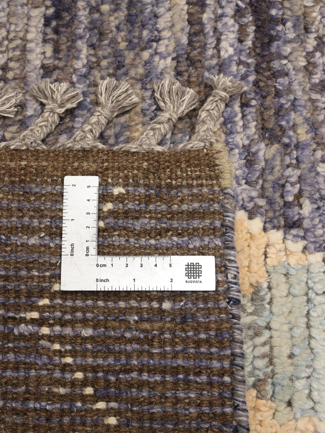Hand-knotted Afghan rug with blue tones and geometric diamond patterns
