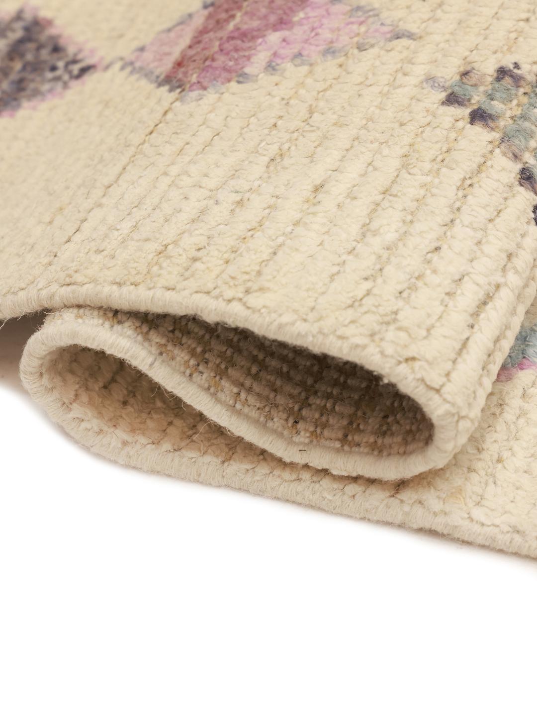 Hand-knotted Berber-inspired rug from Afghanistan with a beige field and multicolor diamond motifs