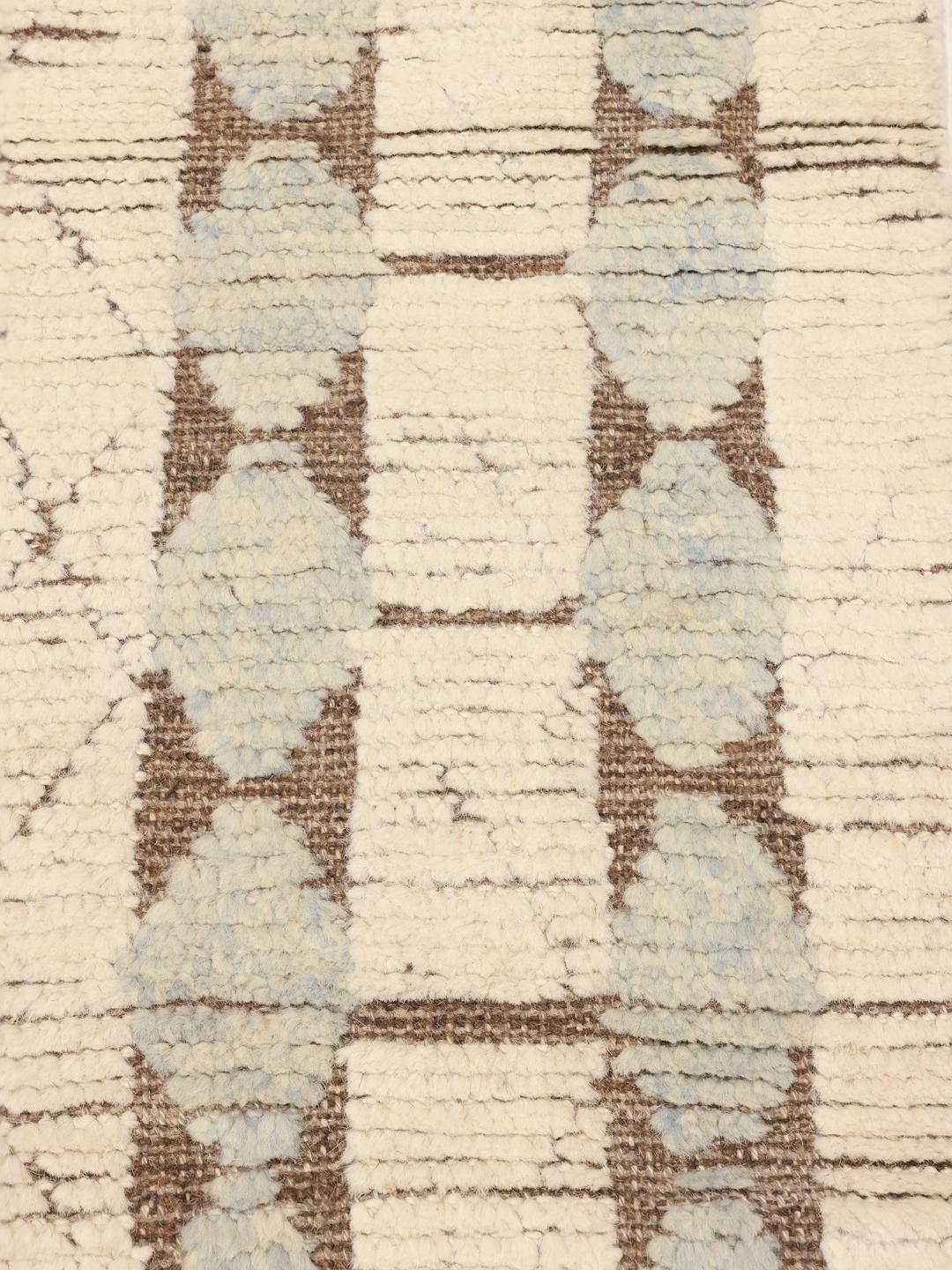 Hand-knotted Afghan rug with a geometric diamond pattern in beige and soft blue tones