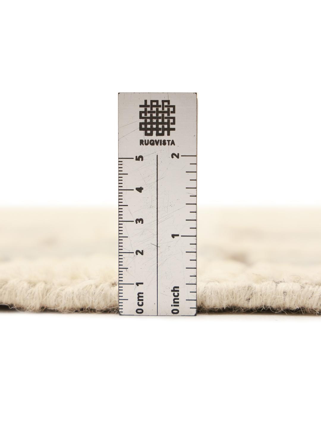 Hand-knotted Afghan rug with a geometric diamond pattern in beige and soft blue tones