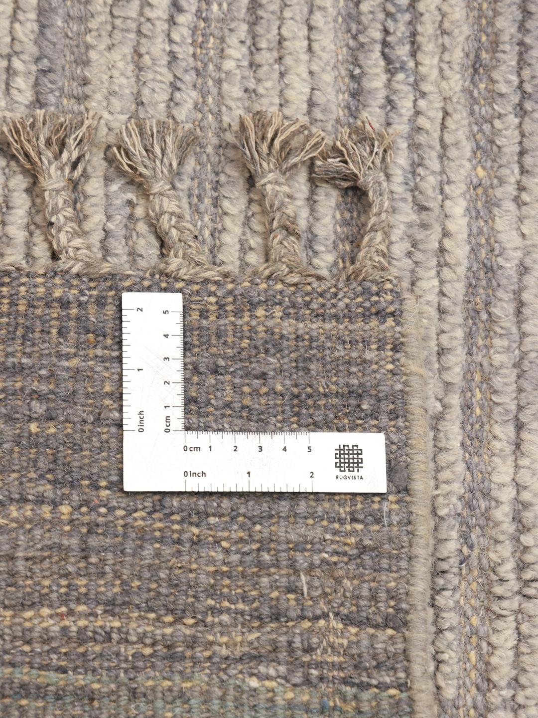 Hand-knotted Afghan rug with neutral geometric patterns in shades of grey