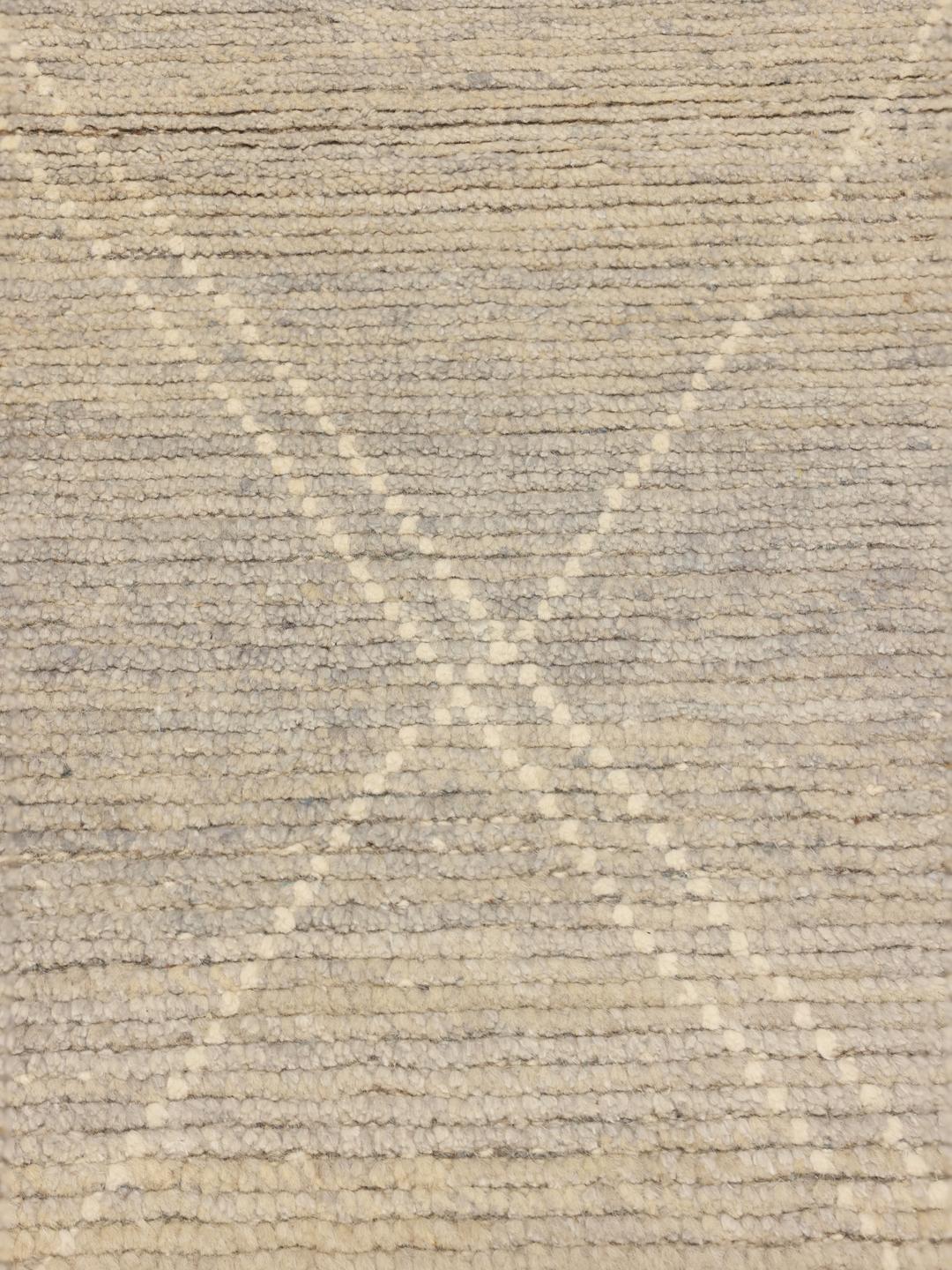 Hand-knotted Berber style rug from Afghanistan in a soft beige colour with a diamond pattern