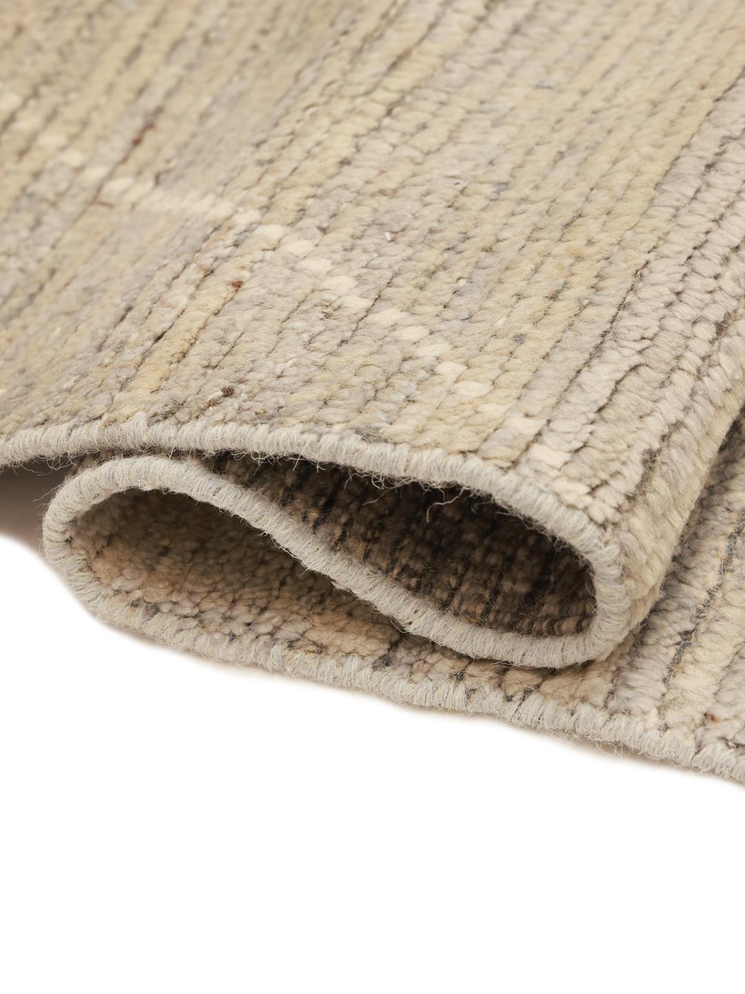 Hand-knotted Berber style rug from Afghanistan in a soft beige colour with a diamond pattern