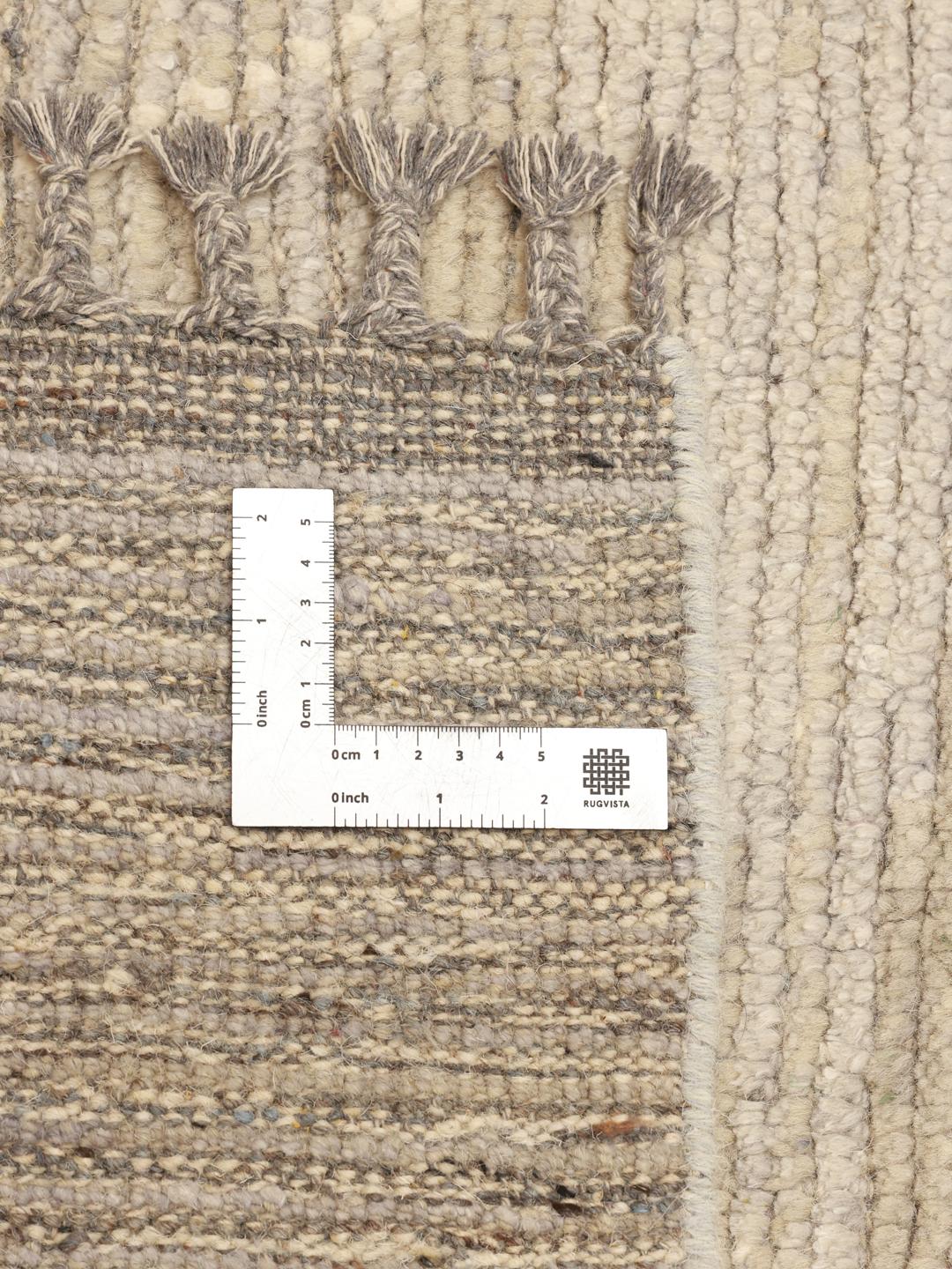 Hand-knotted Berber style rug from Afghanistan in a soft beige colour with a diamond pattern