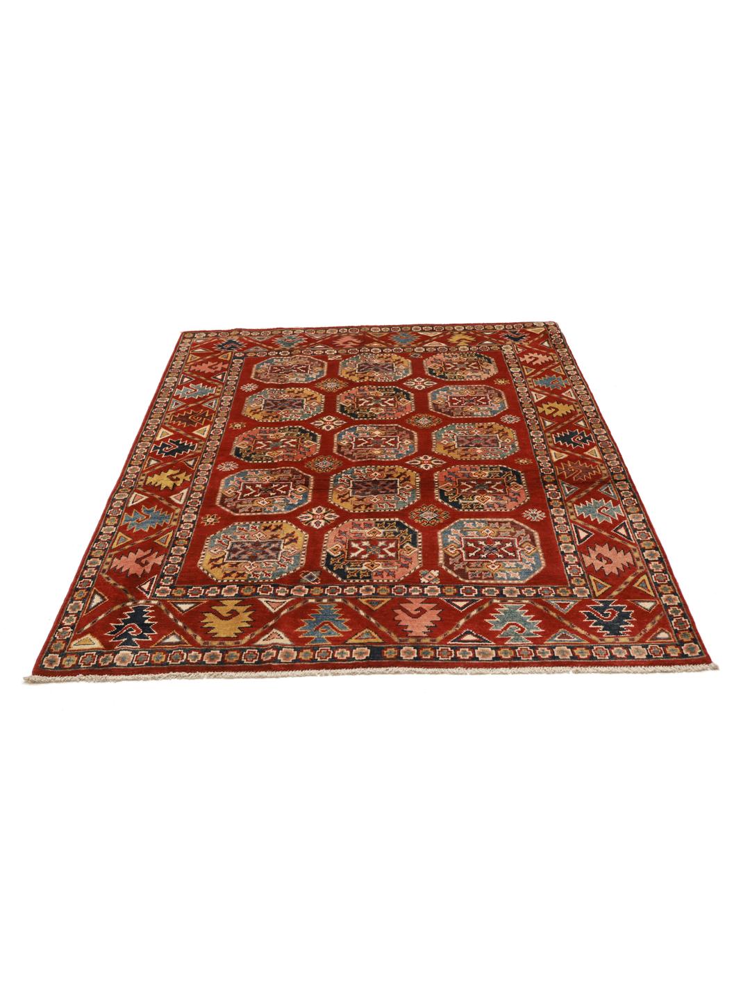A hand-knotted Kazak rug from Afghanistan with a vibrant red field and geometric patterns.