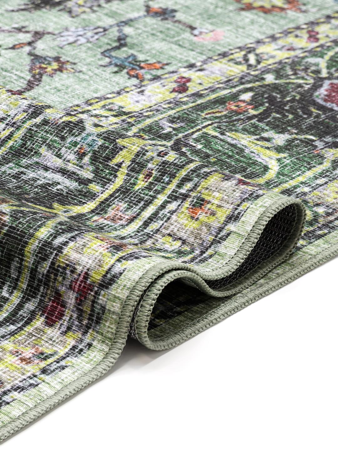 Groen en multicolour vloerkleed met een oosters patroon