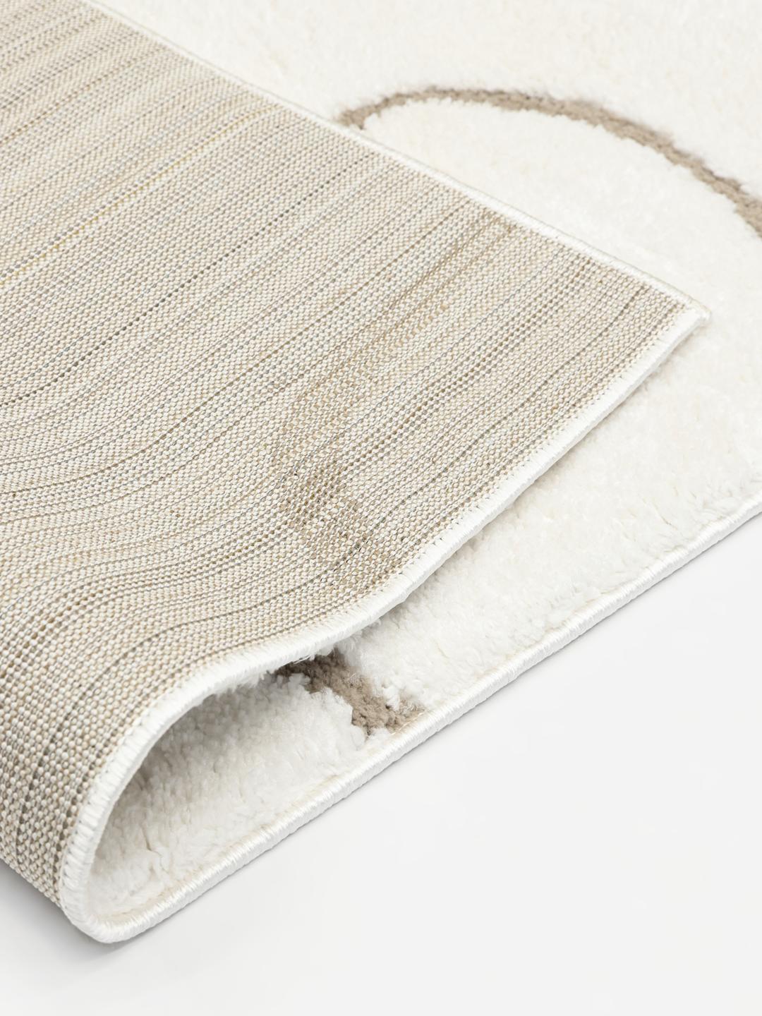 Wit en beige tapijt met hoge en lage pooltextuur