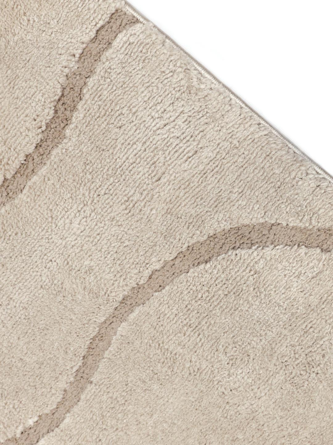 beige tæppe