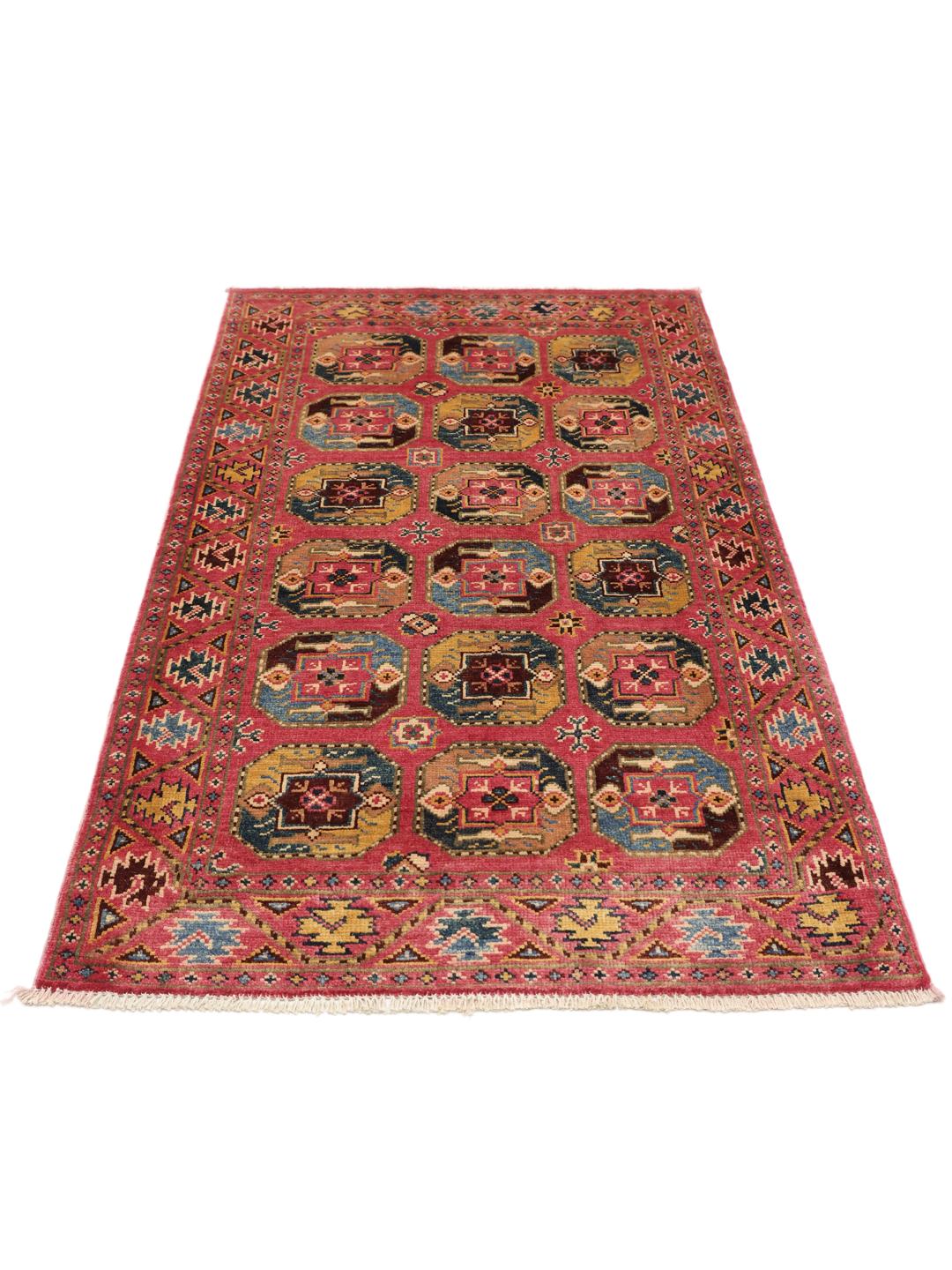 Tapis Kazak afghan noué à la main avec champ rouge et motifs géométriques