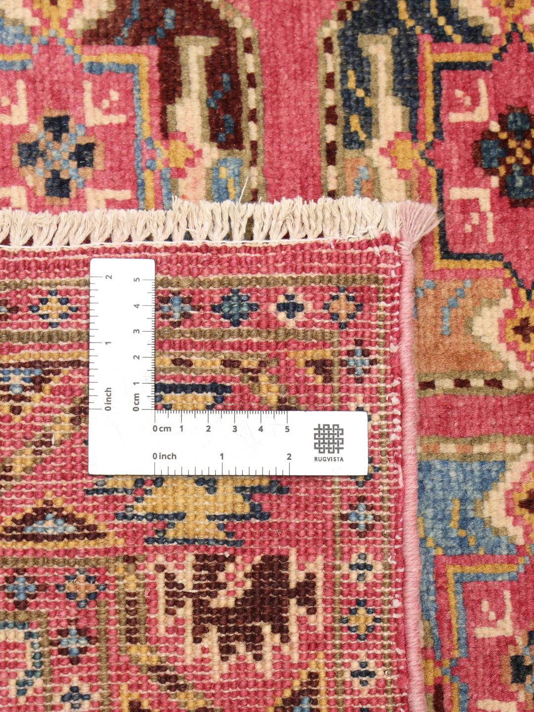 Tapis Kazak afghan noué à la main avec champ rouge et motifs géométriques