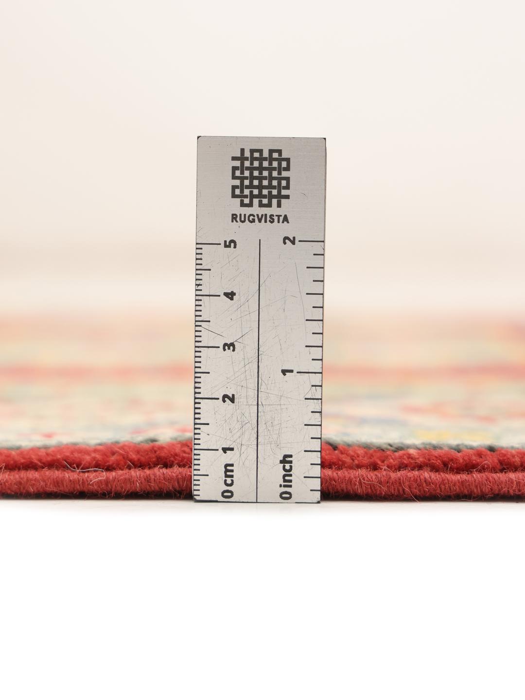Hand-knotted Afghan runner in vibrant red with geometric patterns