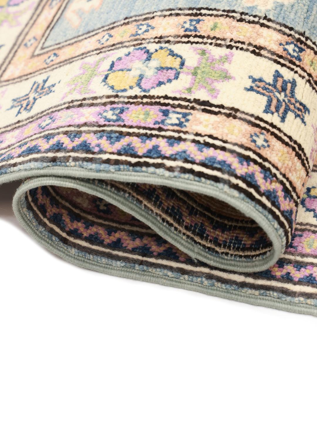 Handgefertigter afghanischer Kazak-Teppich mit geometrischen Mustern in Blau, Rosa und Creme